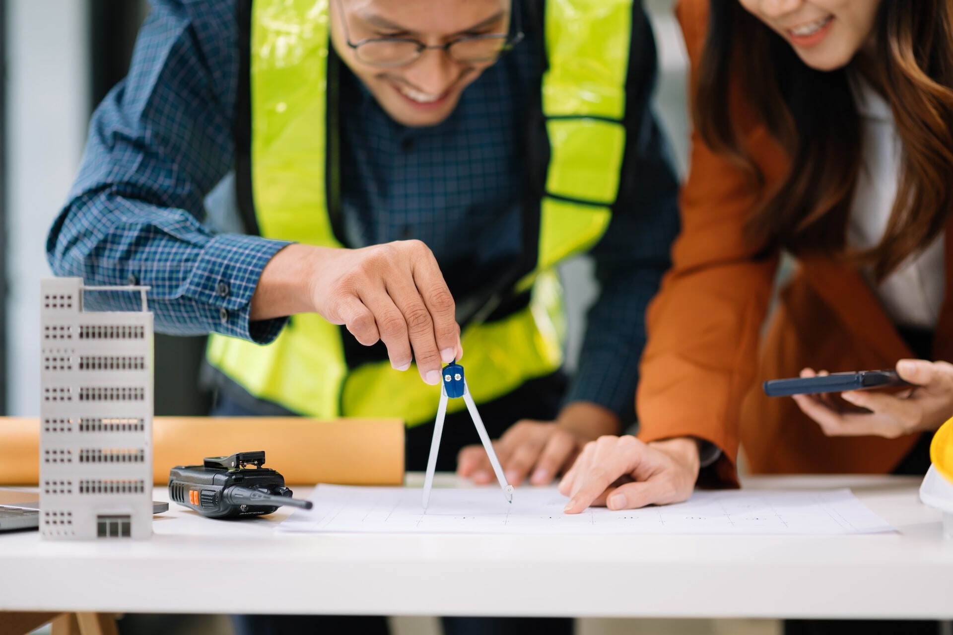architects-working-together-on-building-plan-in-of-2026-03-25-05-45-33-utc